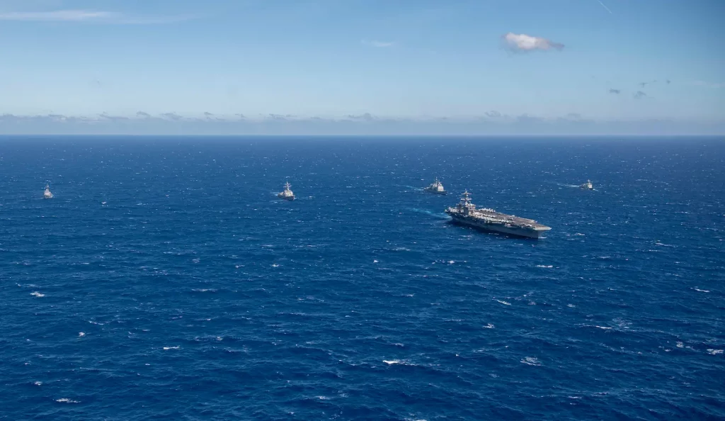 Naval ships patrolling the contested waters of the South China Sea.