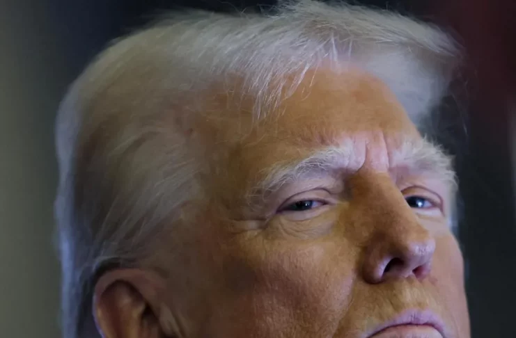 Donald Trump aboard Air Force One during his first trip of his second term." Keywords: Donald Trump, Air Force One, Trump second term.