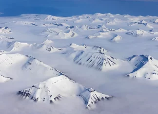 Trump Revives Demand to Buy Greenland in Contentious Call with Danish PM Aerial view of Greenland’s vast ice-covered landscape.