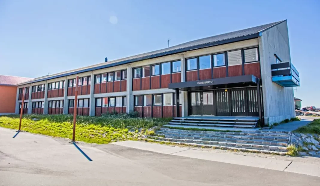 Regierungsgebaeude_Nuuk Greenland's parliament building in Nuuk, symbolizing its self-governance." Keywords: Greenland parliament, Nuuk government, self-governance.