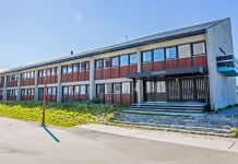 Greenland’s Push for Independence: A Nation on the Rise Greenland's parliament building in Nuuk, symbolizing its self-governance." Keywords: Greenland parliament, Nuuk government, self-governance.