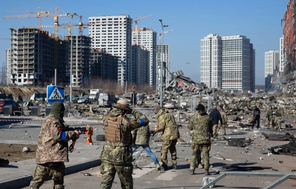 Soldiers patrolling a war-torn area in eastern Ukraine during the ongoing conflict.