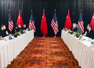 The Latest on U.S. and China Trade Negotiations: What You Need to Know Flags of the United States and China during trade talks.