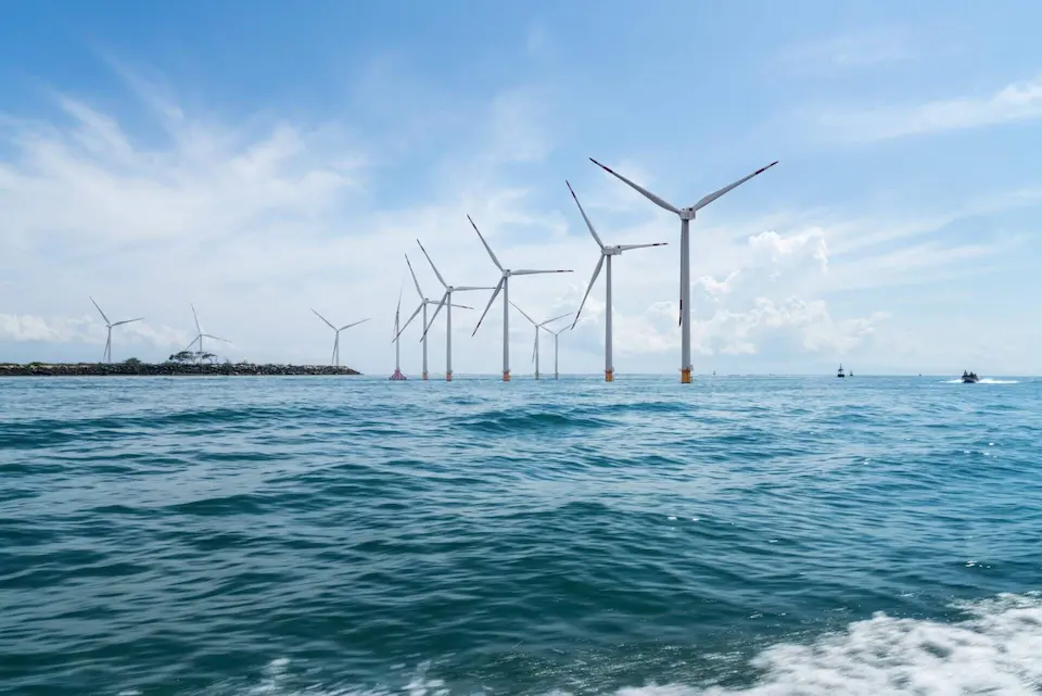 Offshore wind turbines generating clean energy at sea.