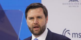 JD Vance speaking at a press conference.