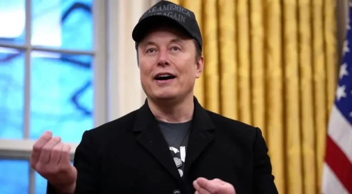 Author of Upcoming Elon Musk Biography Says ‘There Is No Evidence’ Billionaire Has Any ‘Intellectual Achievements’ Elon Musk speaking at a conference, looking serious.