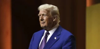 Donald Trump speaking at a rally