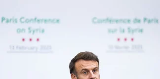 French President Emmanuel Macron speaks at an emergency summit.