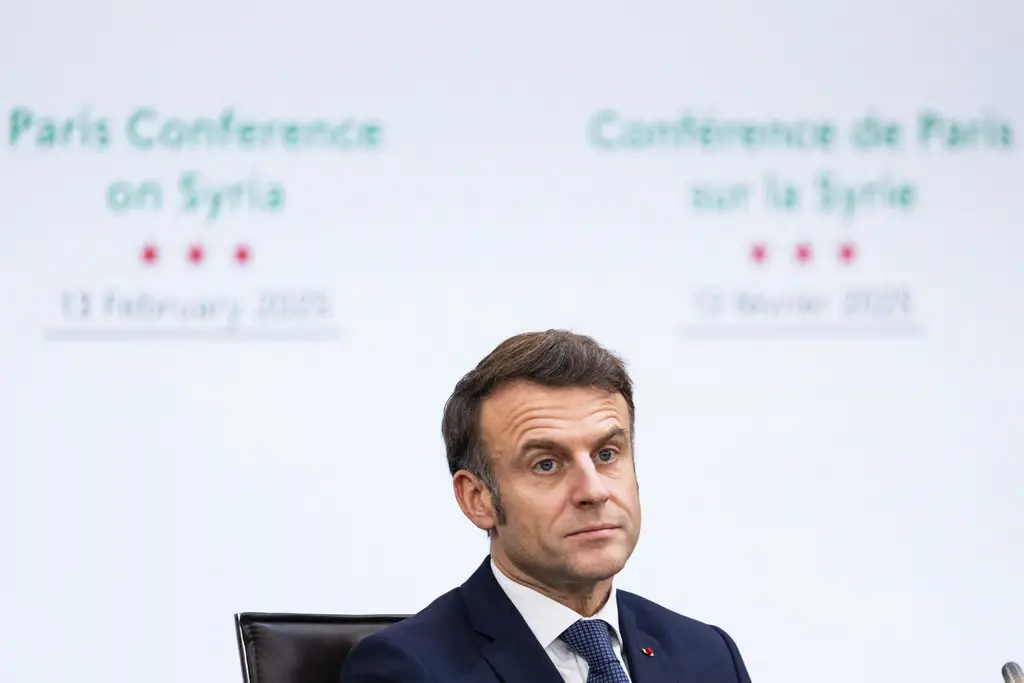 GettyImages-2199058099-scaled French President Emmanuel Macron speaks at an emergency summit.