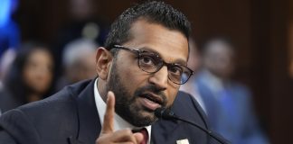 Kash Patel speaking at a political event.