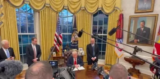 Trump signing an executive pardon for Rod Blagojevich.