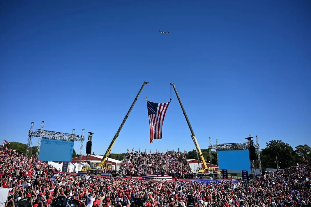 Trump rally crowd cheering as he announces bold border plan.
